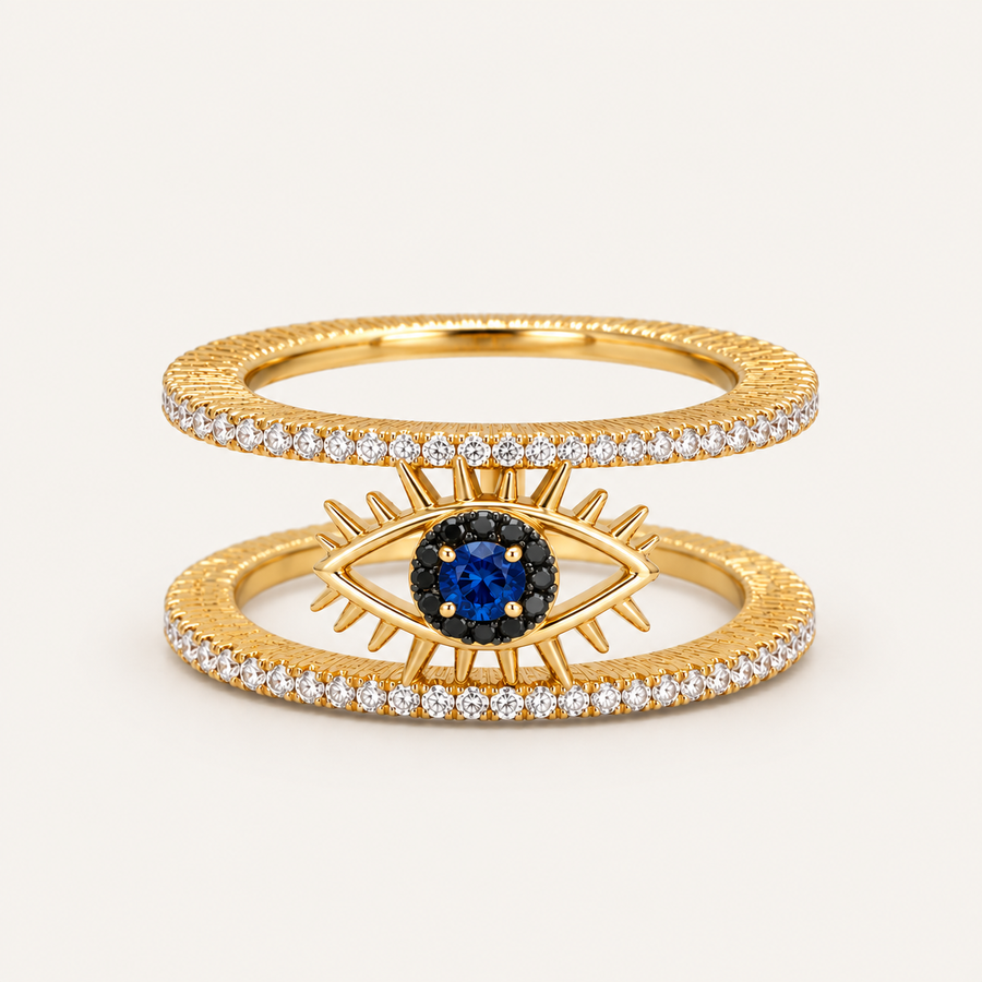Gold Tichi Oura Ring Cap with an blue evil eye and black spinel halo