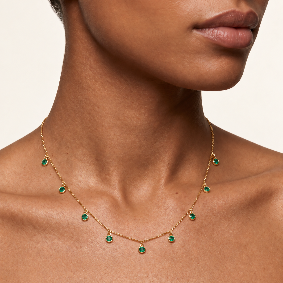 Lumina Yellow Gold Emerald Necklace on neck