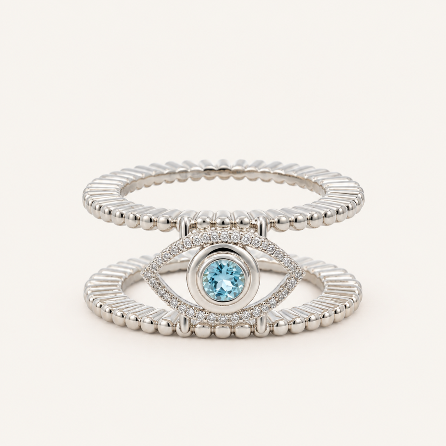 Soleil Tichi Oura Ring Cap in 18K white gold plating with a blue topaz evil eye and moissanite halo