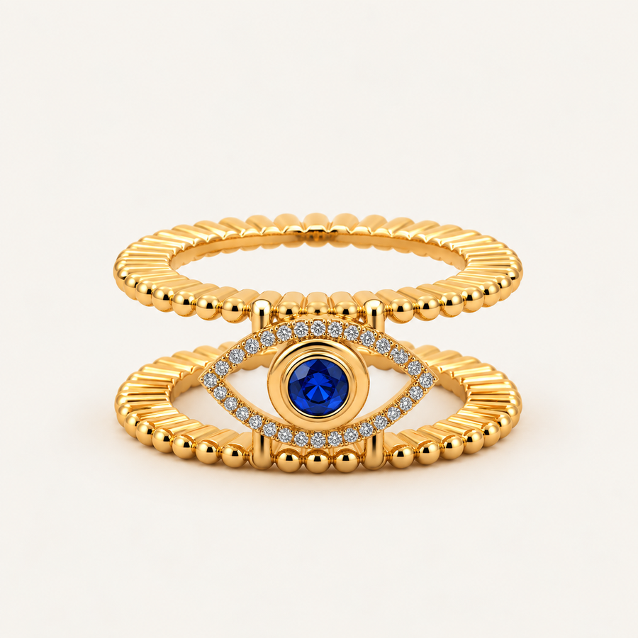 Soleil Tichi Oura Ring Cap in 18K yellow gold plating with a blue sapphire evil eye and moissanite halo