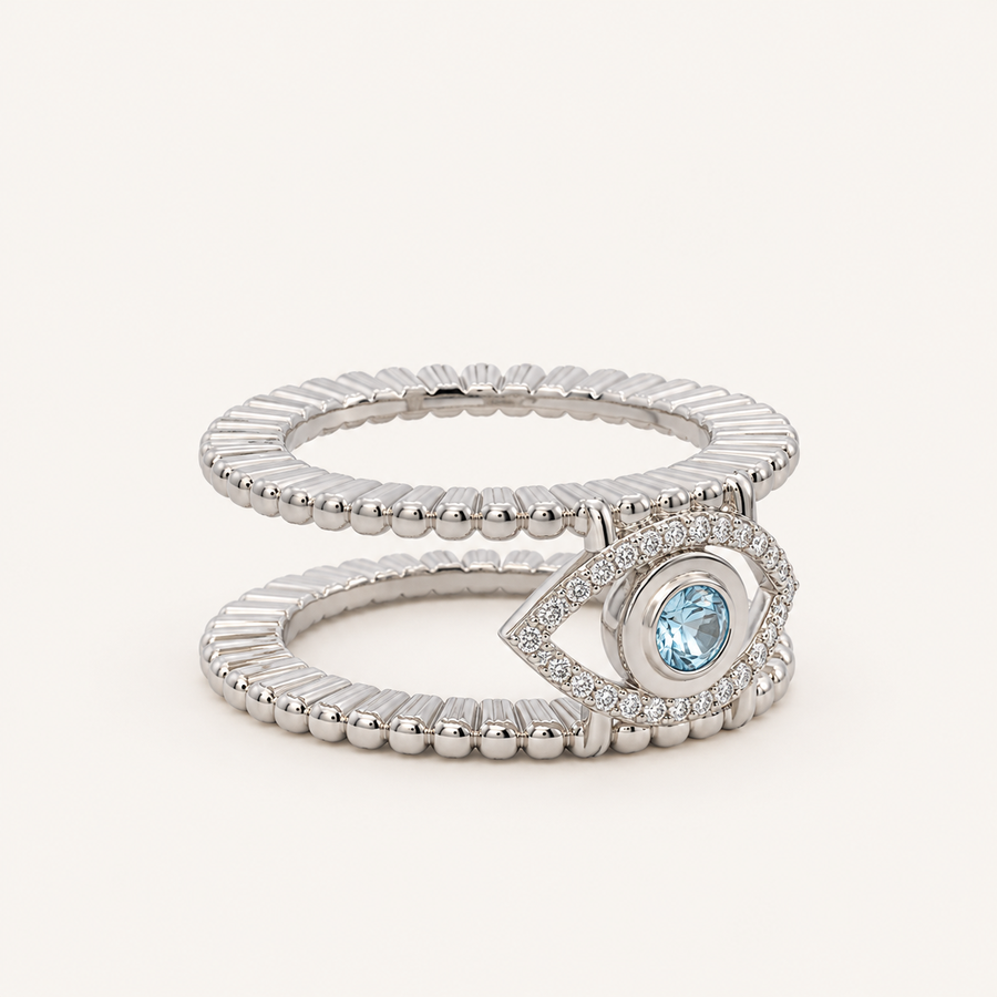Soleil Tichi Oura Ring Jacket in 18K white gold plating with a blue topaz evil eye and moissanite halo