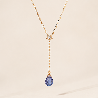 Gold necklace with a blue briolette teardrop pendant