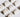 A spread of diamond stud earrings on a white layout