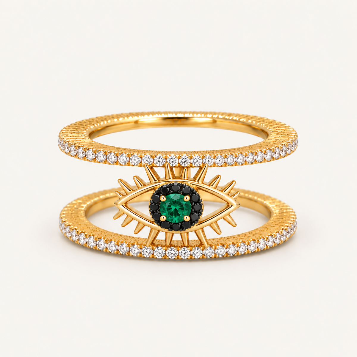 Gold Tichi Oura Ring Cap with an emerald evil eye and black spinel halo