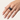Noir Tichi Oura Ring Cap with blue sapphire on a black Oura